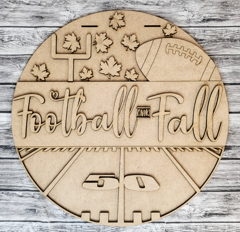 Wooden  Door Hangercutout with 'Football Fall' text on a wooden surface